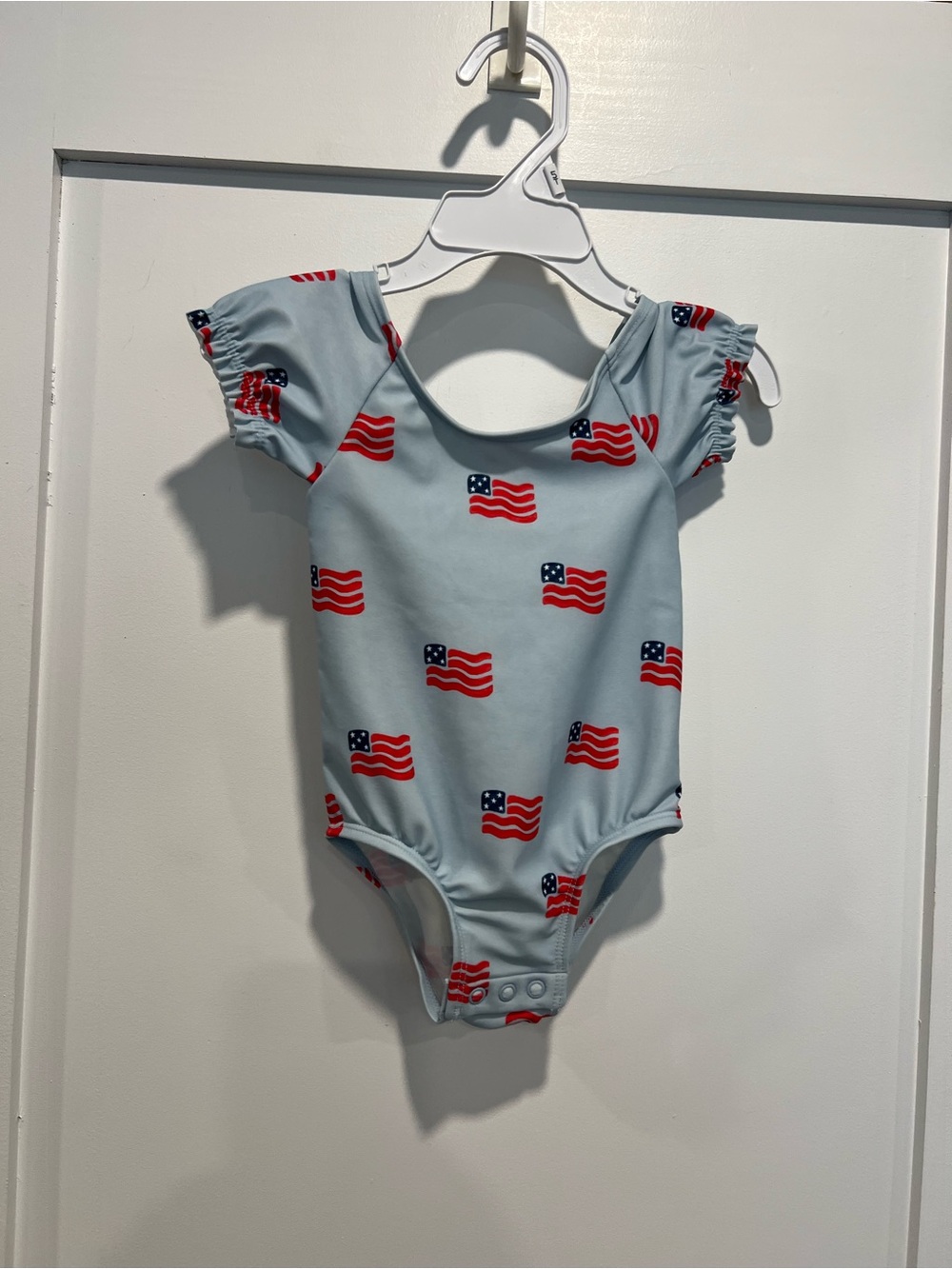 Girls Light Blue One-Piece Swimsuit with Red Flag Print